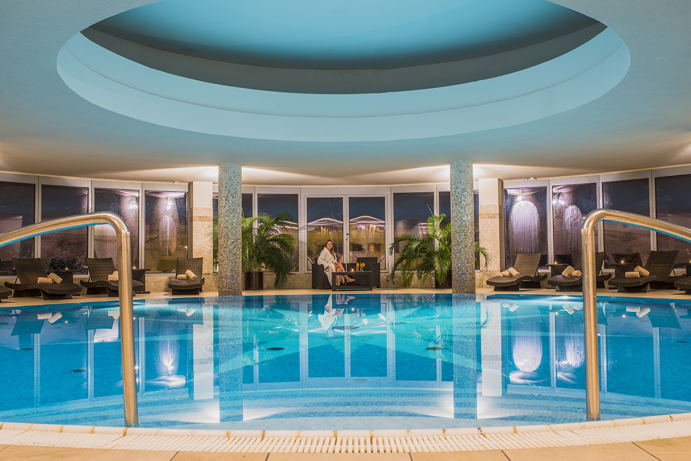 Grandhotel Stary Smokovec indoor pool, loungers, woman in dressing gown 
