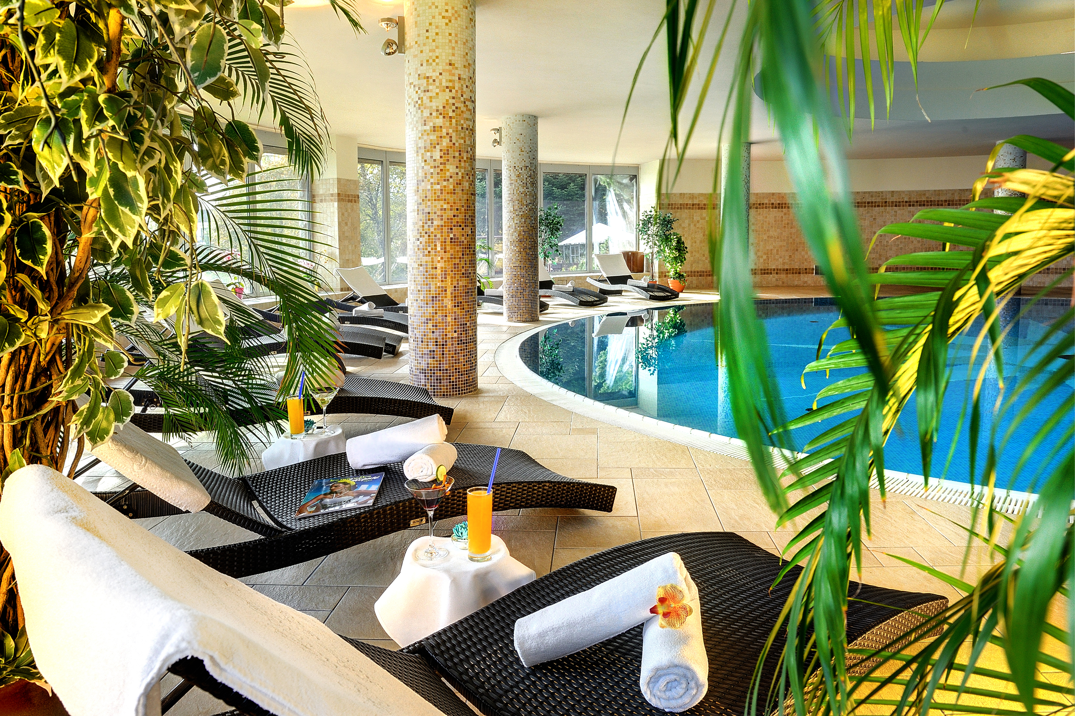 Grandhotel Stary Smokovec poolside, indoor pool, loungers with towels and cocktails