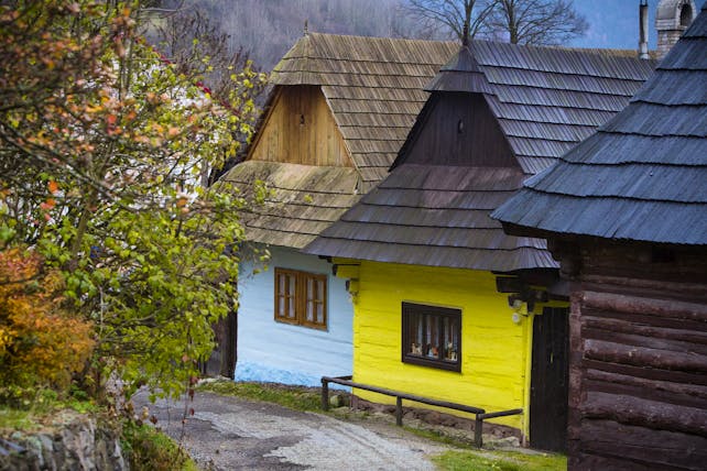 Vlokolinec village in Slovakia, eastern European style houses, wooden roofs, colourful walls