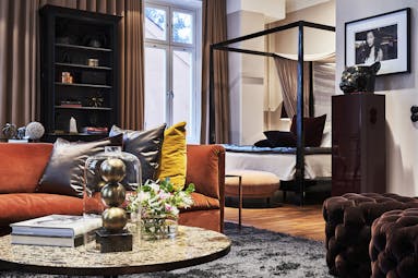 Hotel Lydmar street room, velvet sofa, modern four poster bed, eclectic decor 