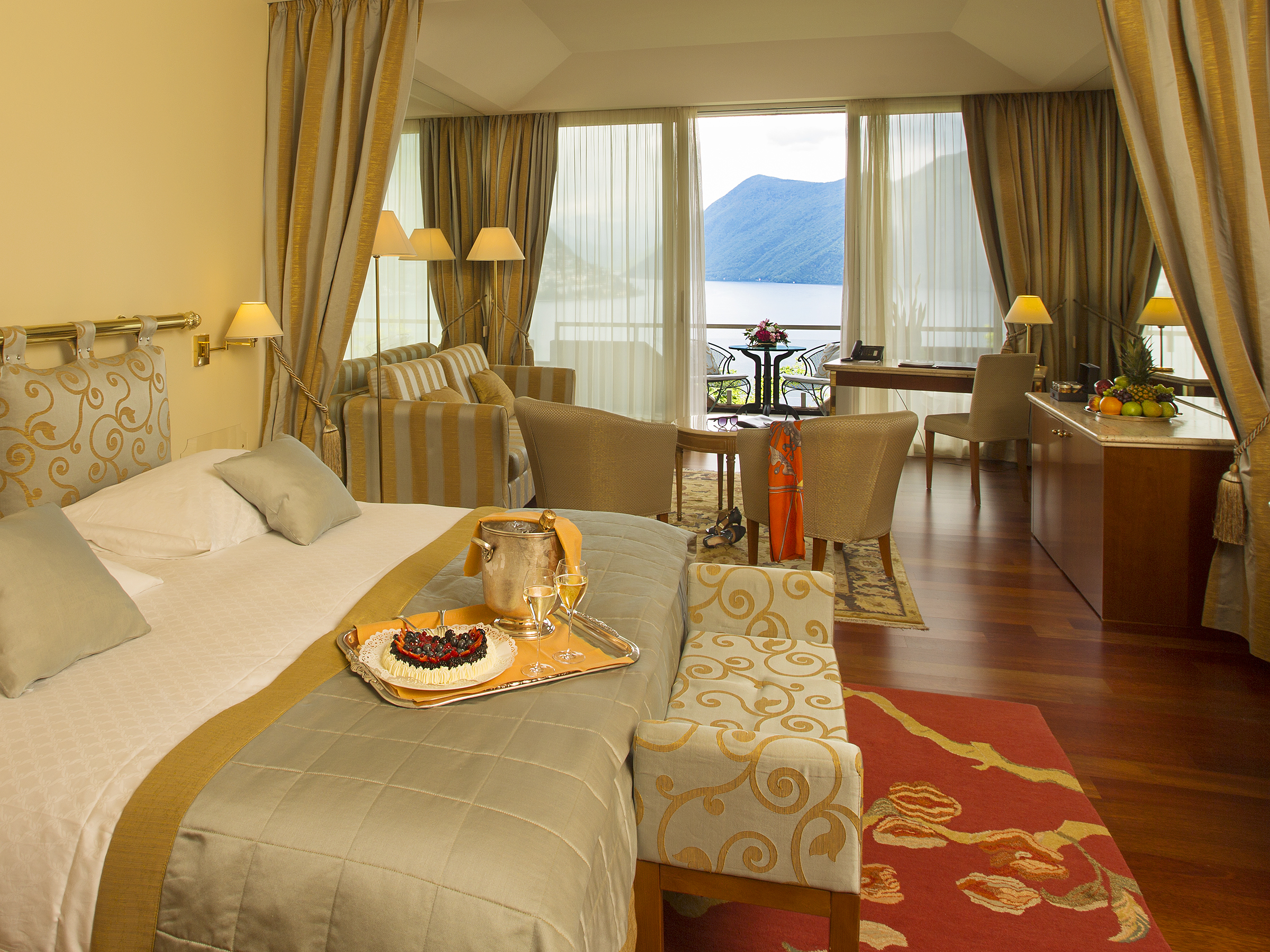 Villa Principe Leopoldo bedroom with lake view, and red carpet