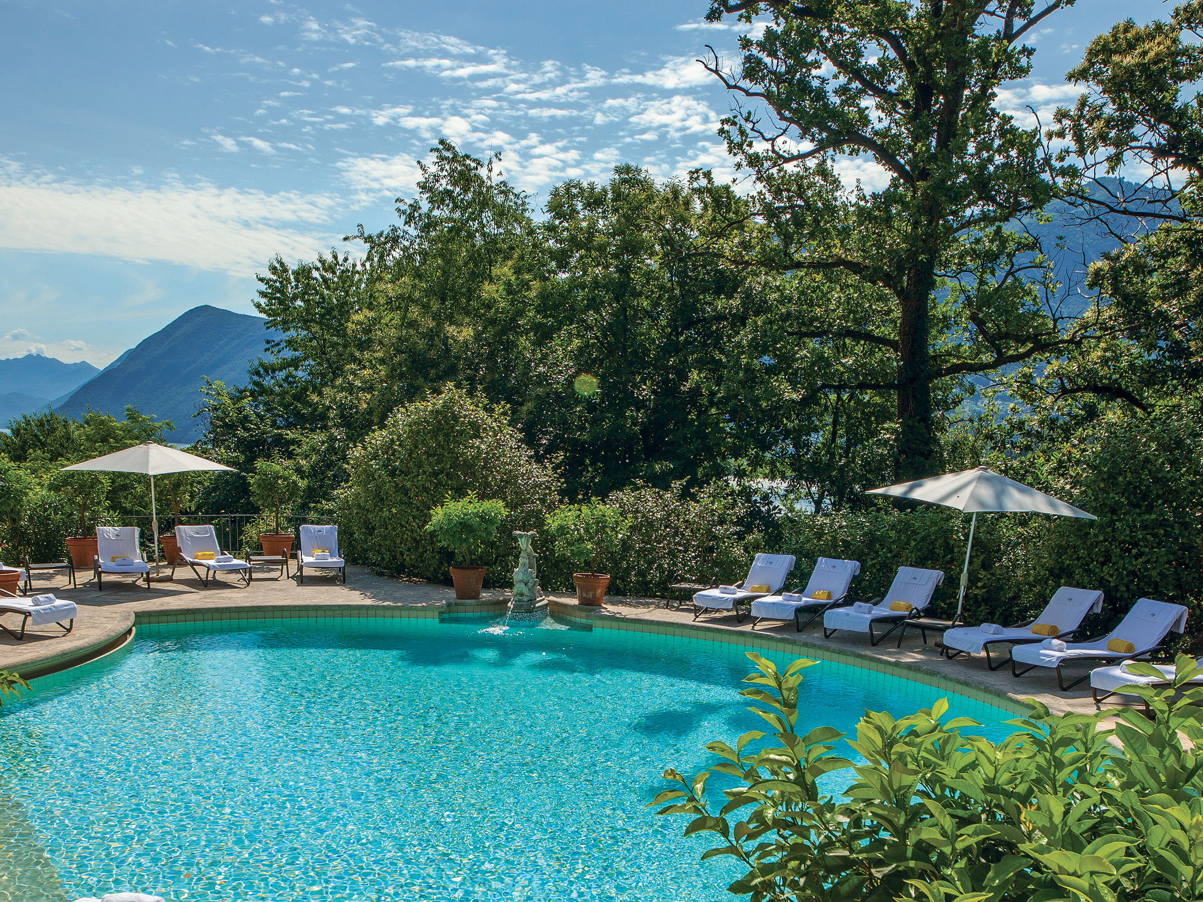 Villa Principe Leopoldo pool with mountains in background