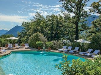 Villa Principe Leopoldo pool with mountains in background