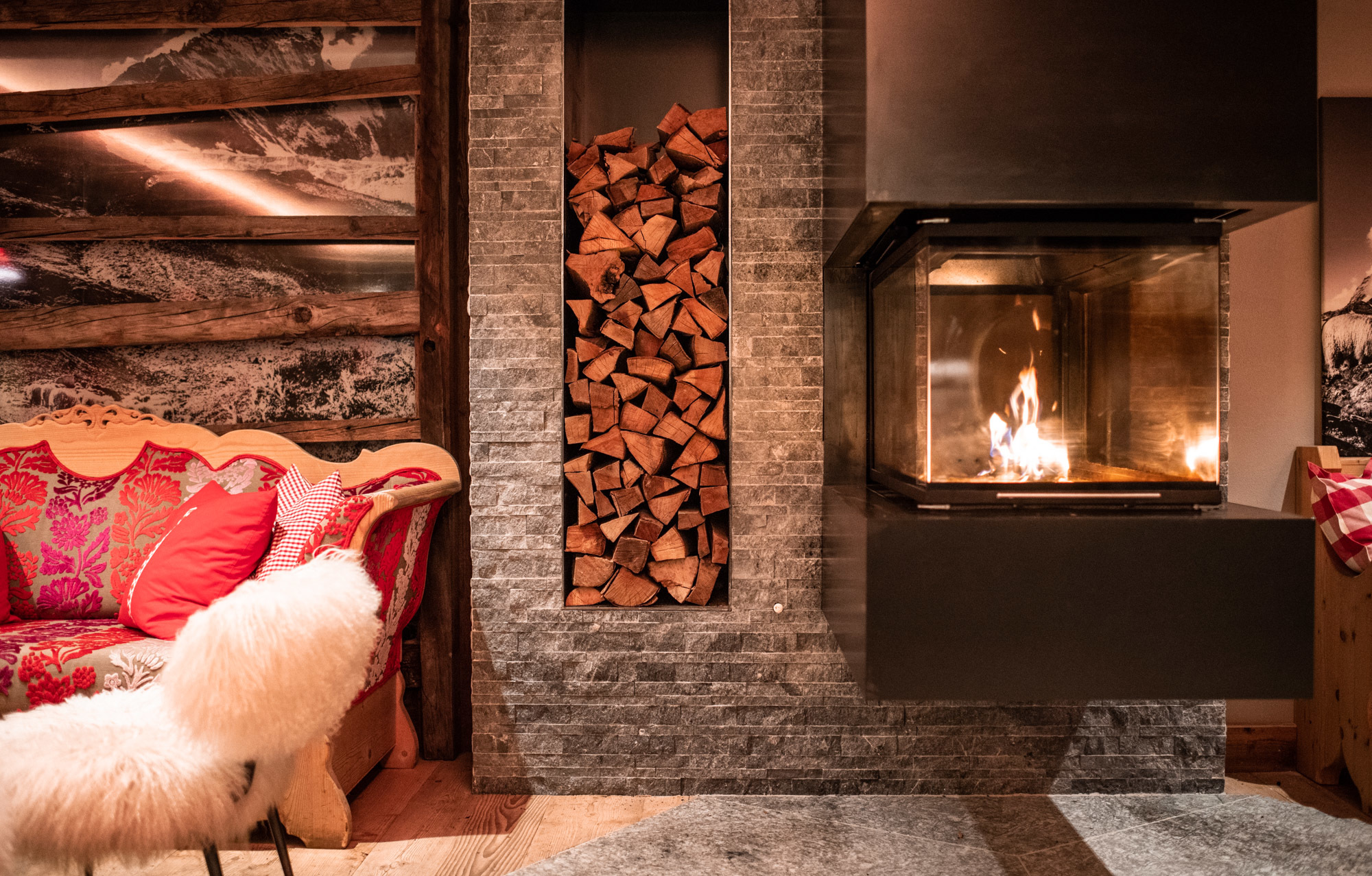 Romantik Hotel Julen Zermatt cosy chairs with open fireplace in lounge