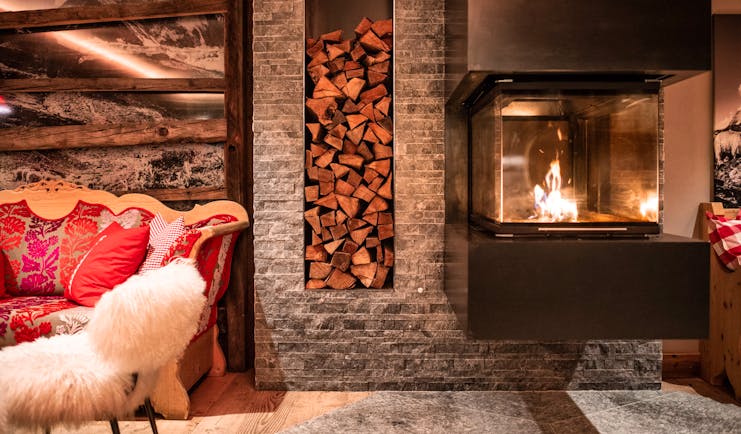 Romantik Hotel Julen Zermatt cosy chairs with open fireplace in lounge