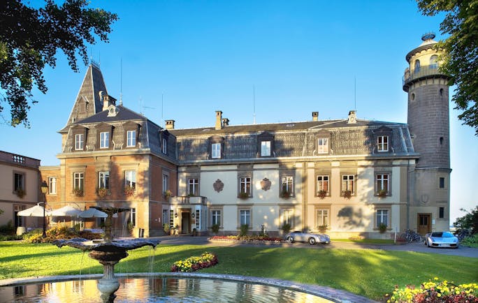 Chateau d'Isenbourg exterior of chteau with tower and pond