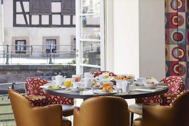 Breakfast table overlooking river at Regent Petite France