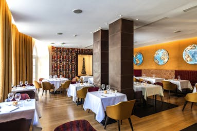 Regent Petite France orange walls and wooden floor of restaurant