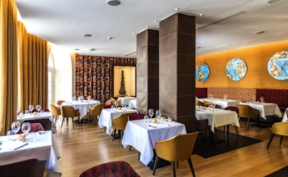 Regent Petite France orange walls and wooden floor of restaurant