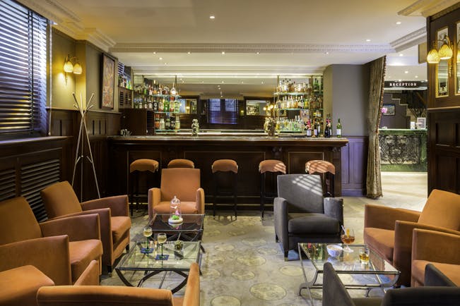 Hotel Regent Contades bar with orange chairs