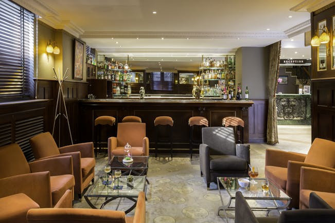 Hotel Regent Contades bar with orange chairs