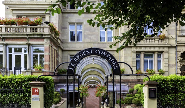 Hotel Regent Contades entrance gate with hedge
