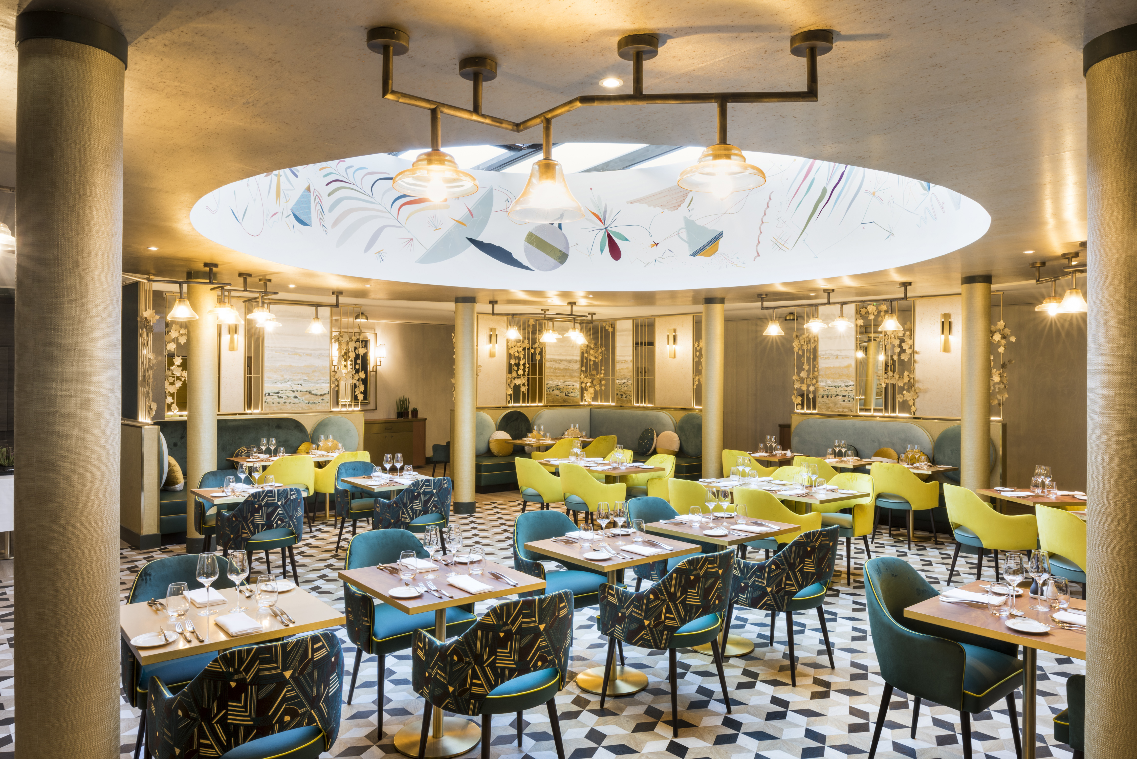 Le Burdigala Bordeaux restaurant with green chairs and black and white floor