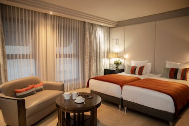 Le Burdigala Bordeaux superior room with orange covers