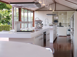 Le Saint James Bordeaux vineyard buildings church behind a small vineyard