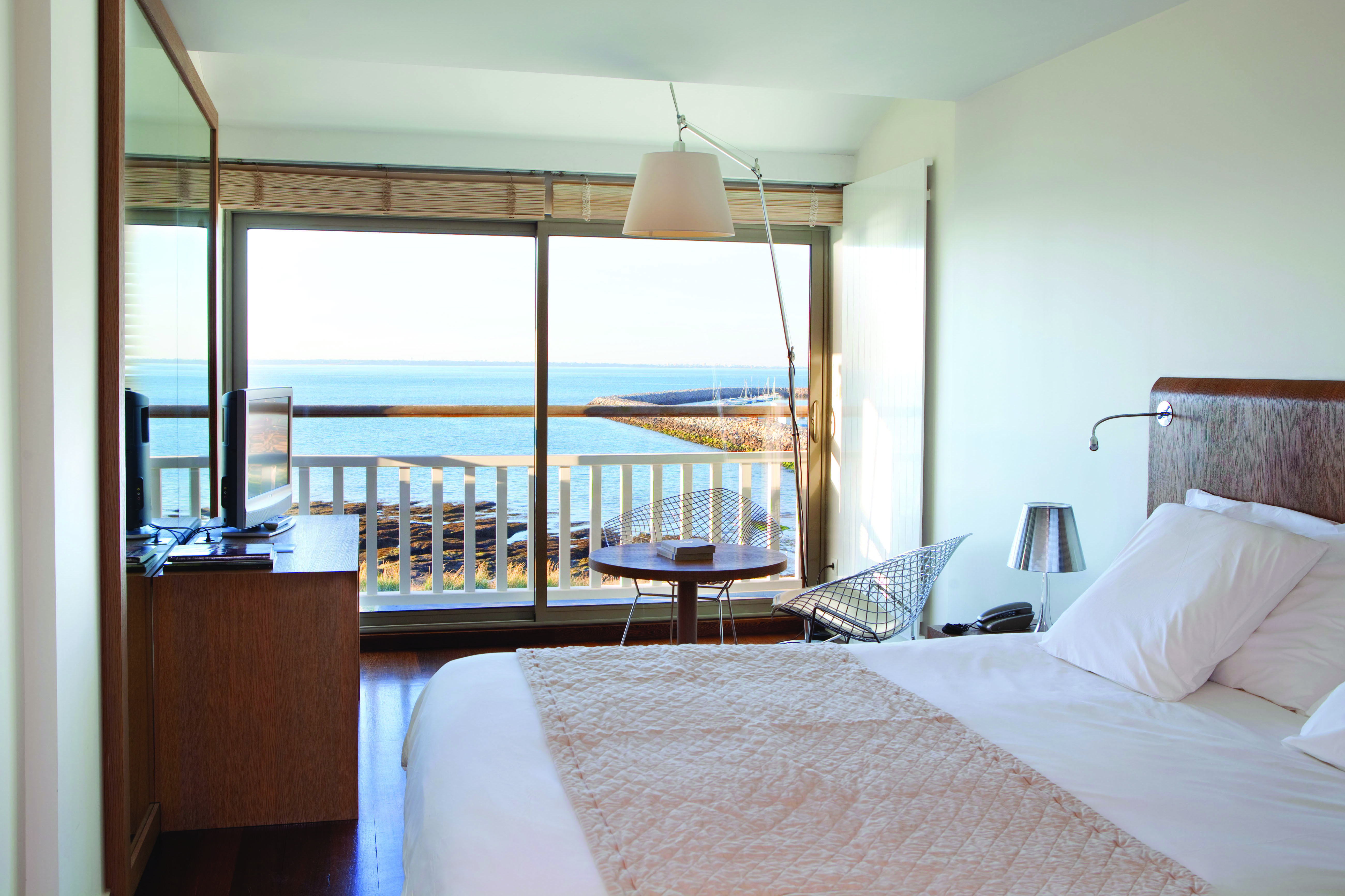 Hotel Anne de Bretagne Brittany superior bedroom metal chairs and table sea view