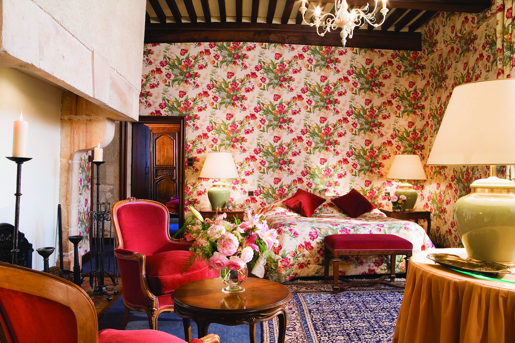  Chateau Gilly Burgundy junior terrace bedroom with floral wallpaper armchairs two bedside tables and lamps