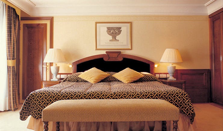 Grand Hotel du Cap Ferrat Cote d'Azur bedroom with ottoman and bedside tables
