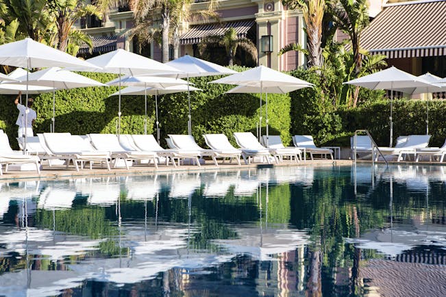 Royal Riviera Cote d'Azur exterior pool with sun loungers and umbrellas