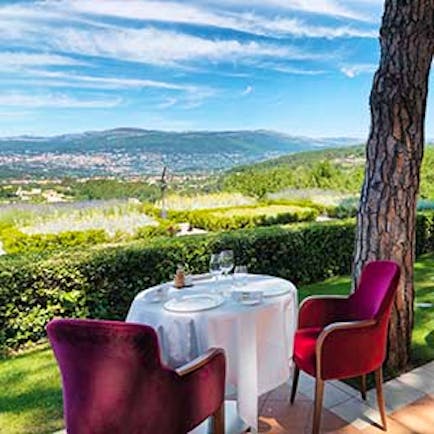 Le Mas Candille Cote d'Azur terrace dining overlooking countryside