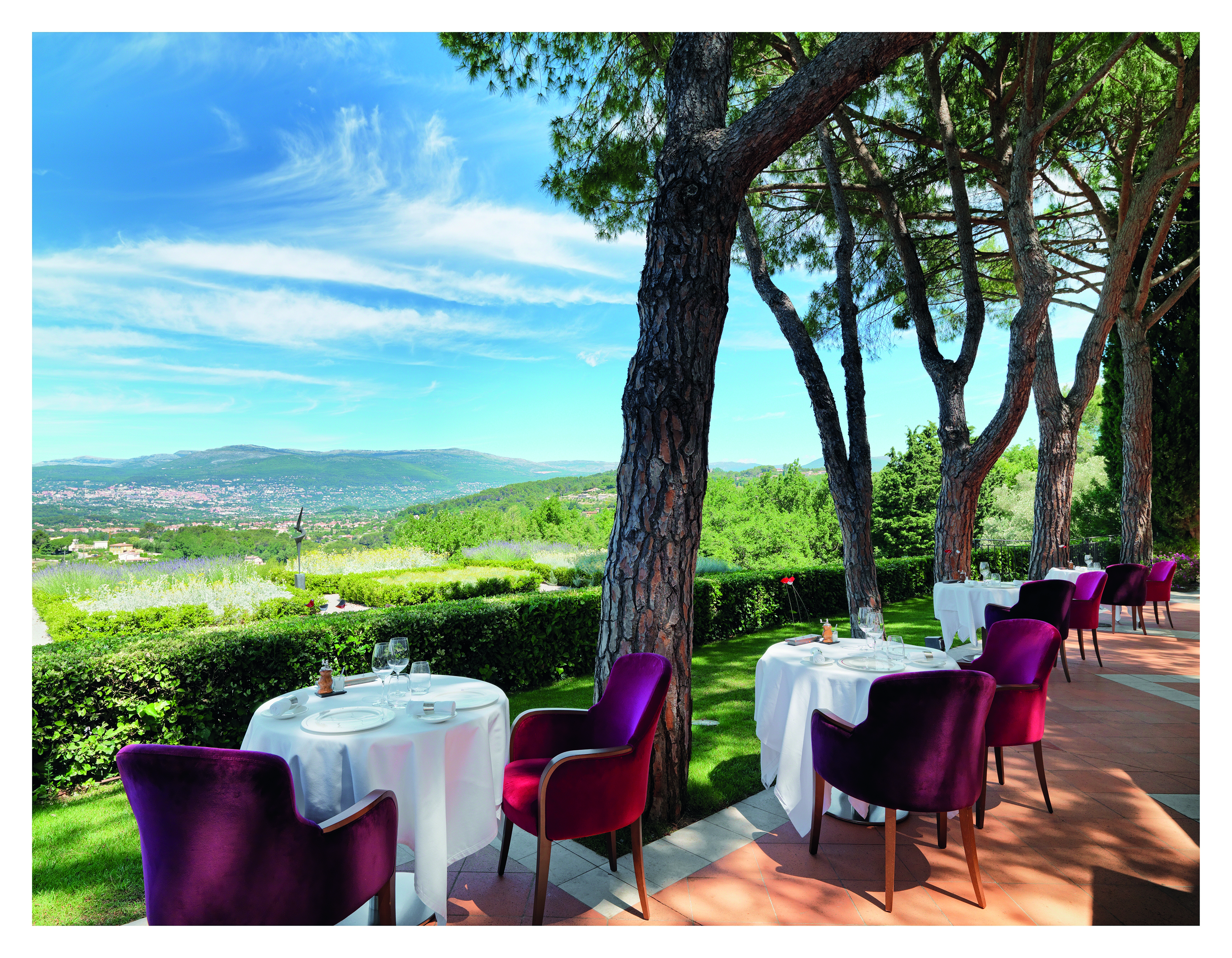 Le Mas Candille Cote d'Azur terrace with dining area overlooking the countryside