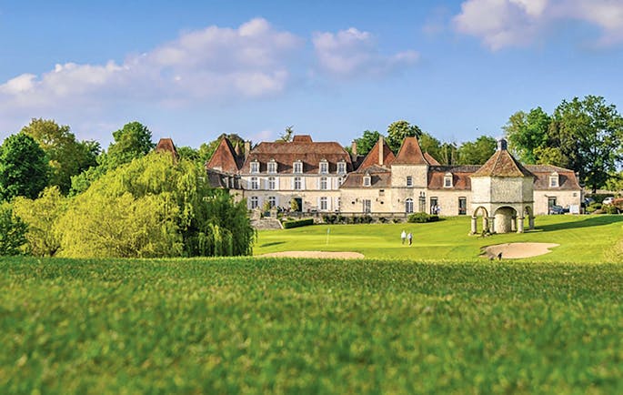 Chateau des Vigiers Dordogne exterior large building with golf course in front