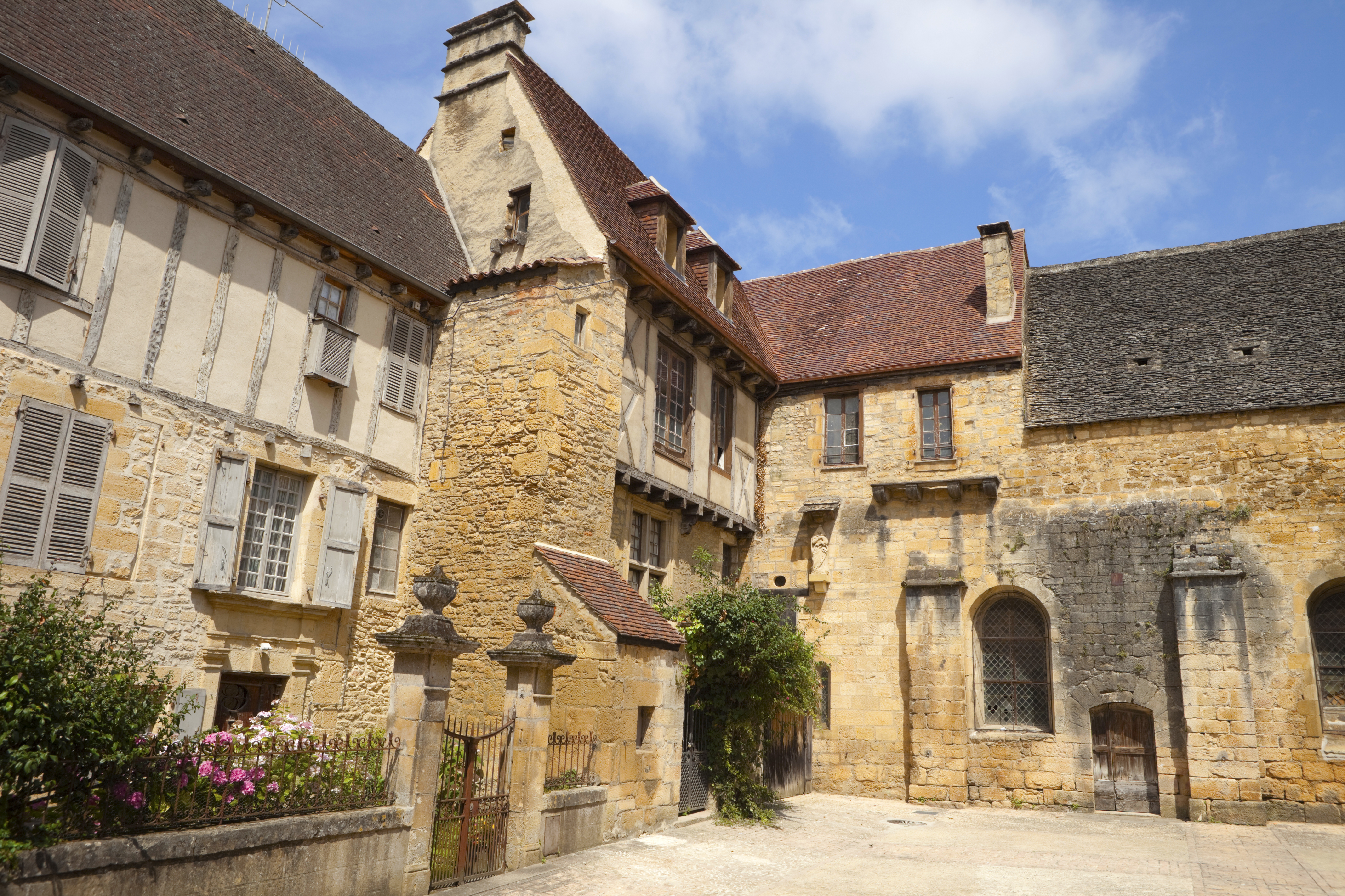 Yellow stone and half timbered houses in Sarlat in the Dordogne