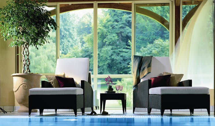 Hotel Royal Alps spa indoor pool chaises longues