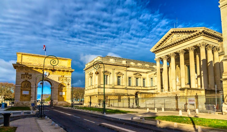 Triumphal arch and classical style courthouse in Montpellier