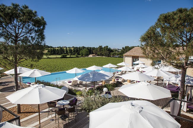 Le Domaine de Verchant Languedoc Roussillon outdoor pool aerial view umbrellas