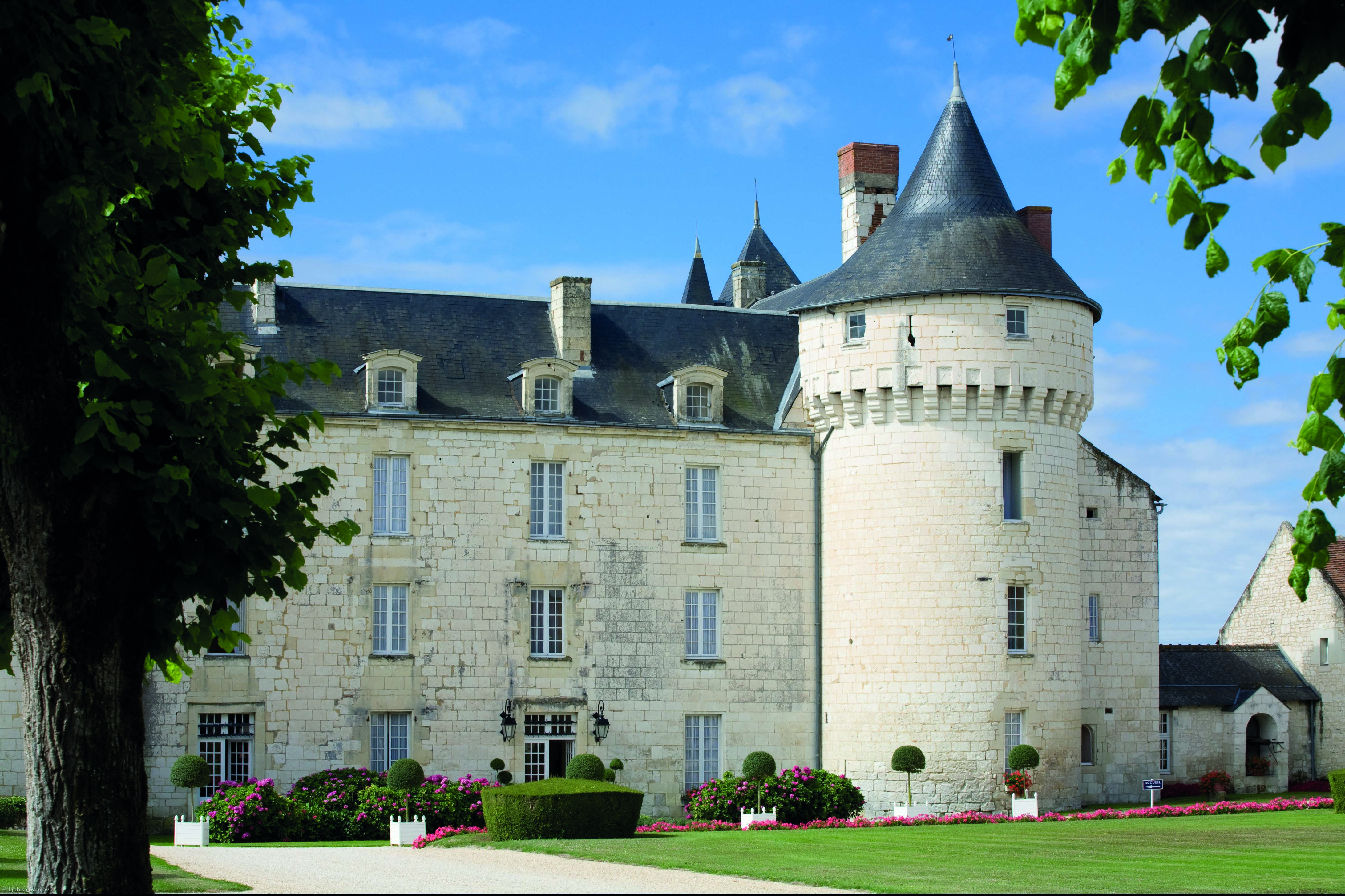 Chateau de Marcay Loire Valley exterior castle large white stone chateau with a turret and grey roof