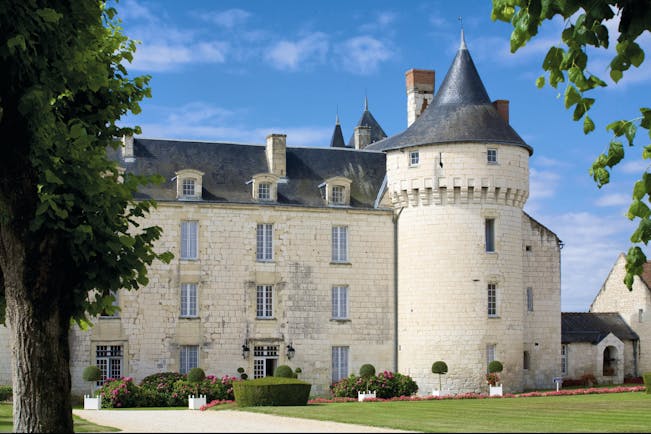 Chateau de Marcay Loire Valley exterior castle large white stone chateau with a turret and grey roof