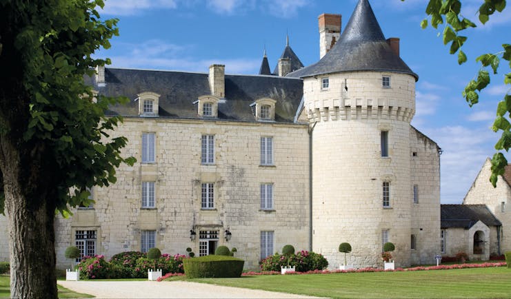 Chateau de Marcay Loire Valley exterior castle large white stone chateau with a turret and grey roof