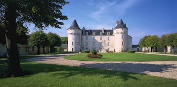 Chateau de Marcay Loire Valley exterior garden large white chateau looking over a lawn
