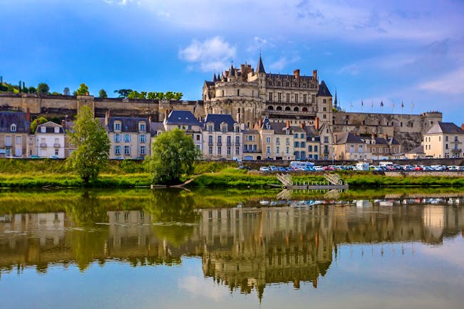 Castle on hill above town overlooking river Loire at Amboise