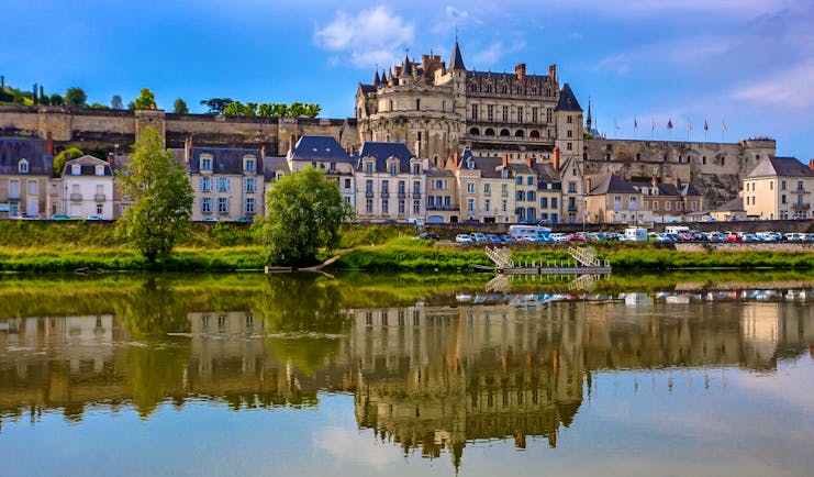Castle on hill above town overlooking river Loire at Amboise