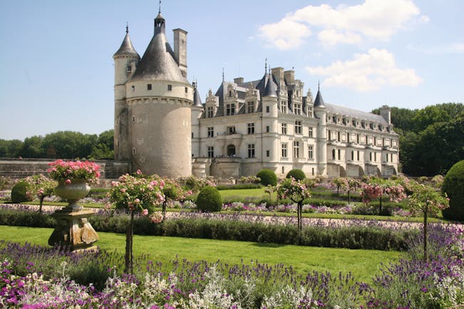 Chateau of Chenonceau with tower and turrets and formal gardens