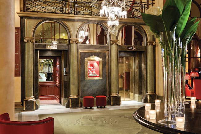 Hotel Royal Barriere lobby, grand decor, old fashioned lifts, chandelier, columns,
