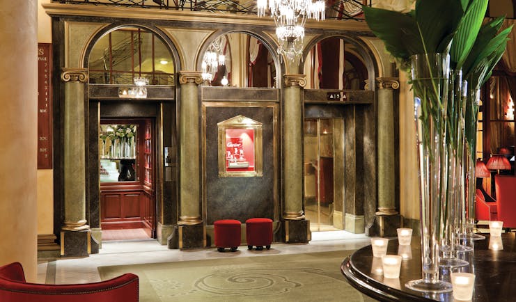 Hotel Royal Barriere lobby, grand decor, old fashioned lifts, chandelier, columns,
