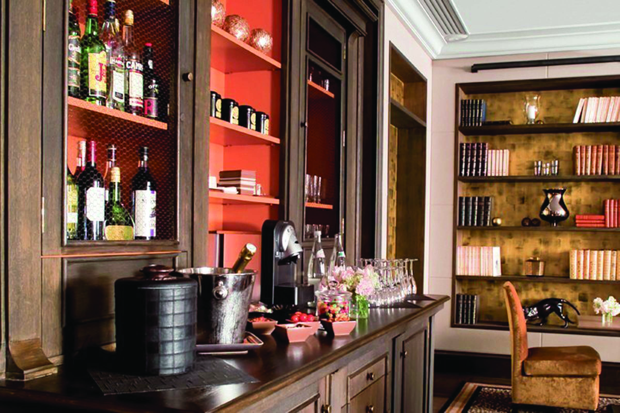 Hotel Esprit Saint Germain Paris complimentary bar area with bottles and coffee machine