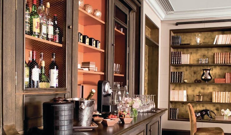 Hotel Esprit Saint Germain Paris complimentary bar area with bottles and coffee machine