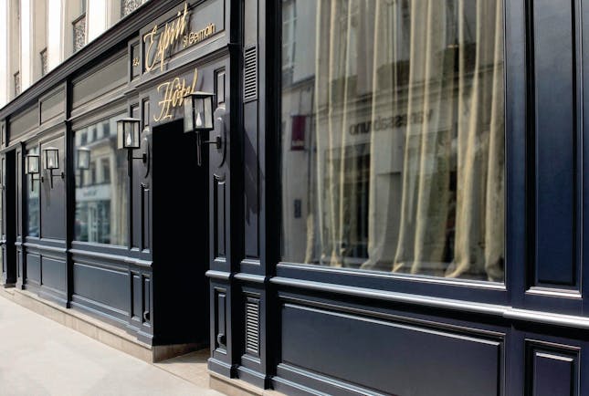 Hotel Esprit Saint Germain Paris entrance dark fronted hotel with a sign reading 'Esprit Saint Germain'