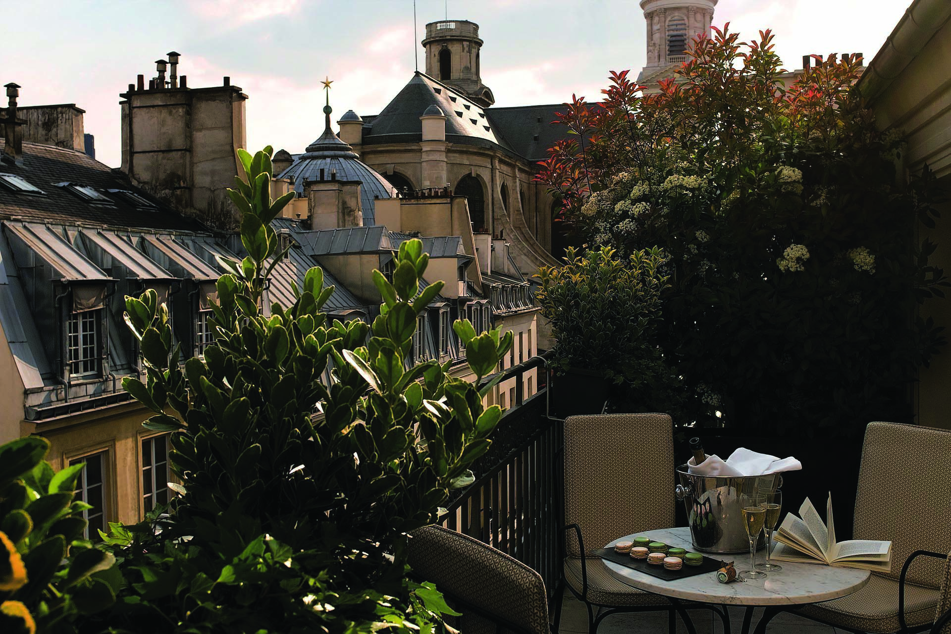 Hotel Esprit Saint Germain Paris terrace view champagne bottle and glasses and macarons