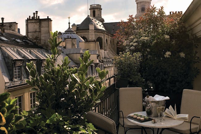 Hotel Esprit Saint Germain Paris terrace view champagne bottle and glasses and macarons