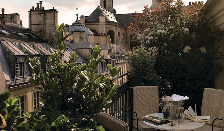 Hotel Esprit Saint Germain Paris terrace view champagne bottle and glasses and macarons
