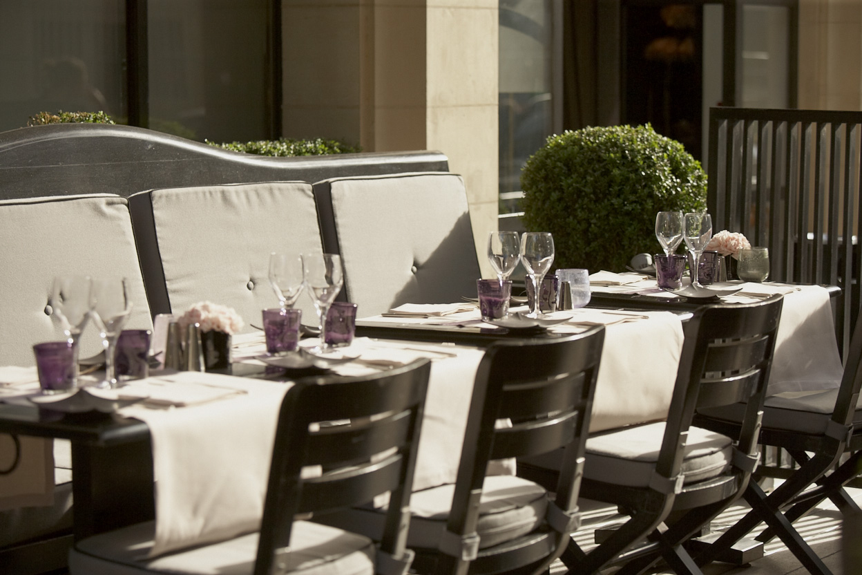 Hotel Montalembert outside dining with benches and chairs