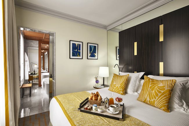 Hotel Montalembert bedroom of suite with breakfast tray