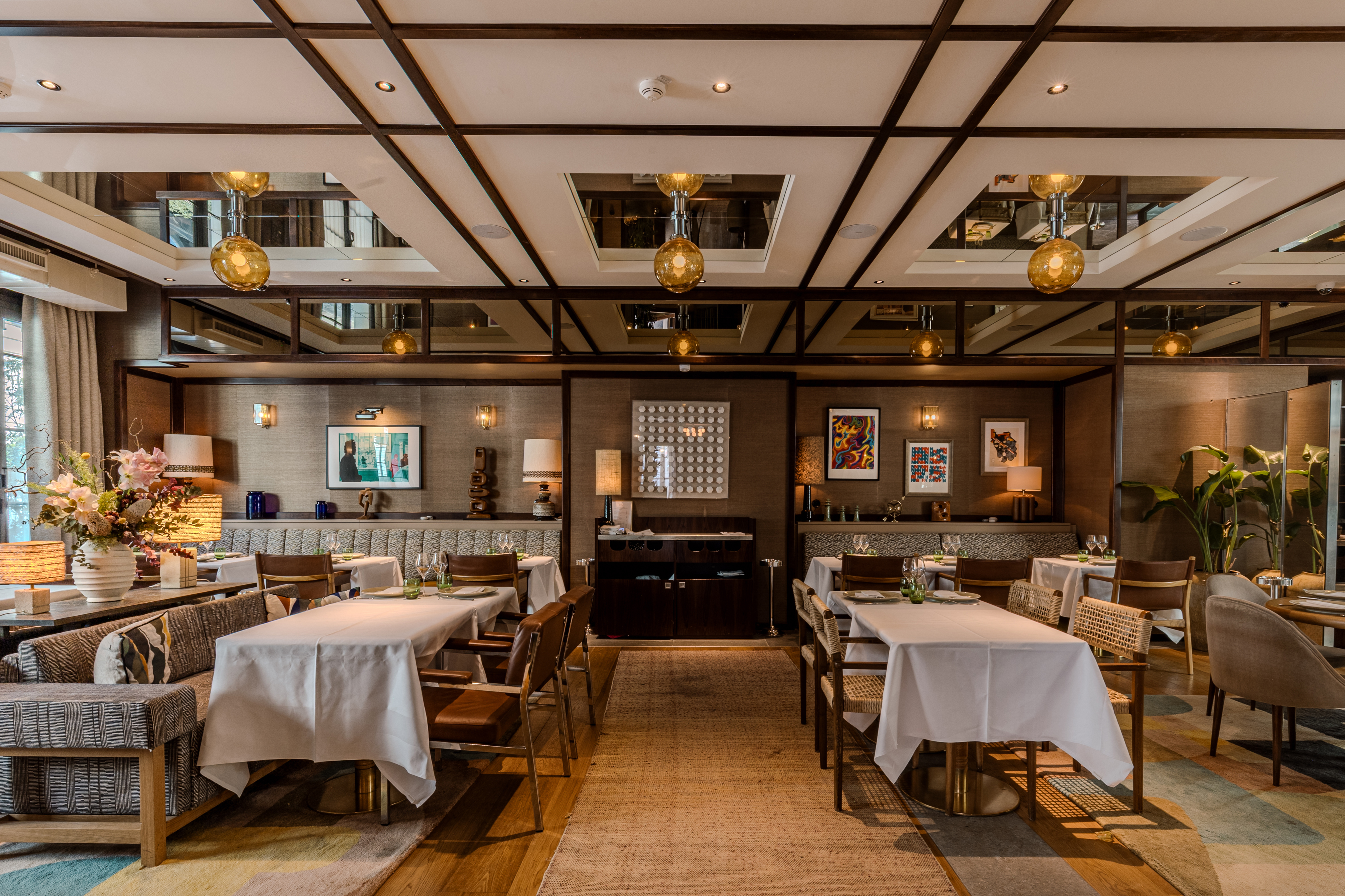 Hotel Norman Restaurant, with fine beamed ceiling, wooden chairs and sofas
