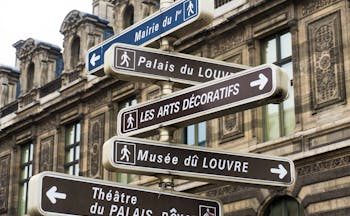 Direction signs for tourists of sites in Paris