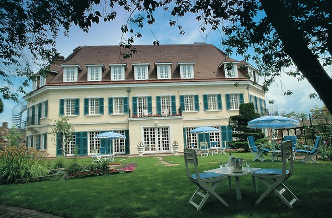 Chateau de Montreuil Pas de Calais exterior white building with blue shutters and gardens